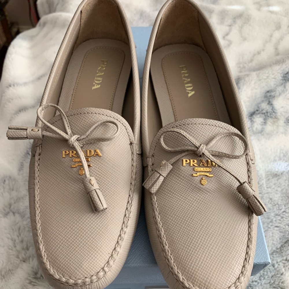 Prada leather light gray loafers.